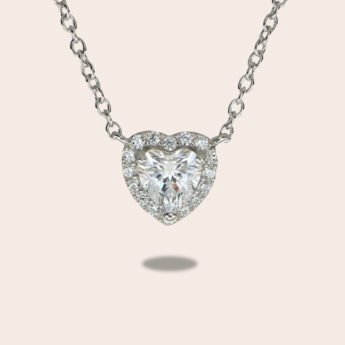 Ciondolo micro cuore bianco con pave'